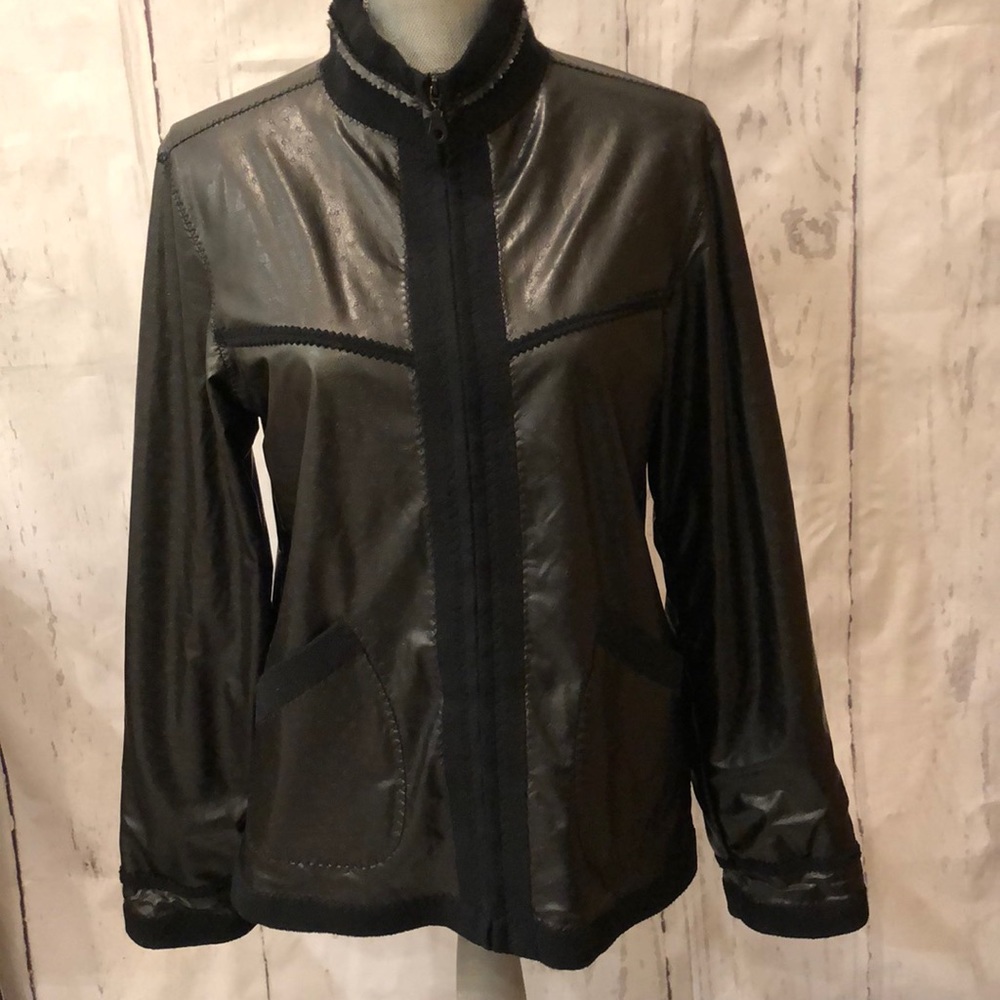 Black Soft Jacket Looks and feels like leather.